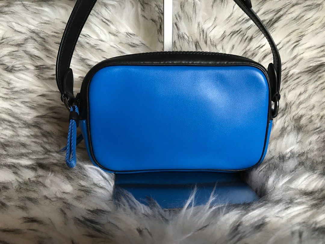 Coach Micro sling bag (Category: Luxury Bags & Wallets) located in Santa Rosa. Submitted by rina.rina3 (Listing ID 1315343233, Image 2). Description: Coach micro sling bag with adjustable strap Preowned (but can really pass as brand new) from Japan 🇯🇵 Very nice blue color Very excellent gunmetal hardwares Sturdy, lightweight and super pretty in person Can be worn as shoulder or crossbody bag Bag dimensions, LXWXH all in inches 6.5in x 2.5in x 4
