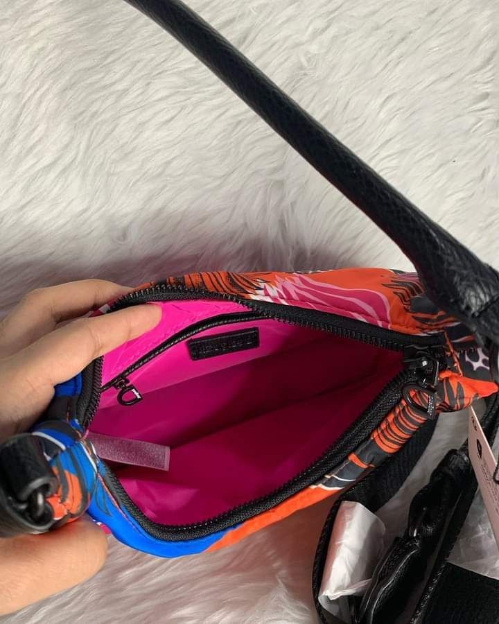 Desigual Two-way bag (Category: Luxury Bags & Wallets) located in Quezon City. Submitted by odxctrl (Listing ID 1315381084, Image 2). Description: - Crossbody strap included - Brand new with price tag - MOP : GCASH & BANK TRANSFER ONLY.