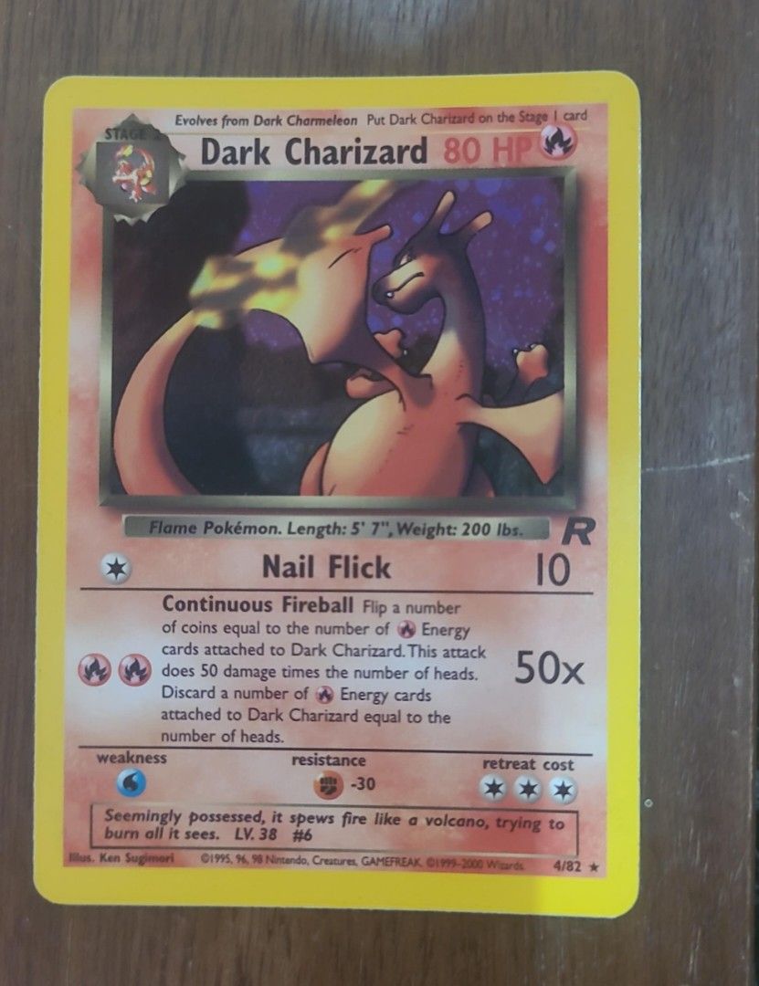 holographic dark charizard card value Top 7 Cards to Collect: Pokemon scanner this PSA 8 card is the perfect way to showcase your collection. Dark Charizard Holo (4/82) 1st