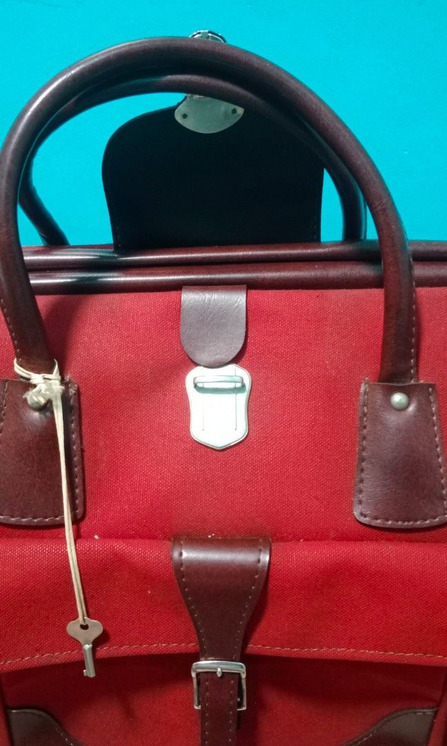 PORTER Large Luggage Porter Handbag (Category: Luxury Bags & Wallets) located in Butuan. Submitted by fabchichub (Listing ID 1315358291, Image 2). Description: This is an AUTHENTIC AND ORIGINAL, LIKE NEW NO FLAWS Porter Large Luggage Duffle Porter-type Luggage Duffle Handbag. This luggage porter-type handbag is large and can fit A LOT of your travel things. Bought in Japan during our Asian trip and used a couple of times only. Very sturdy made of