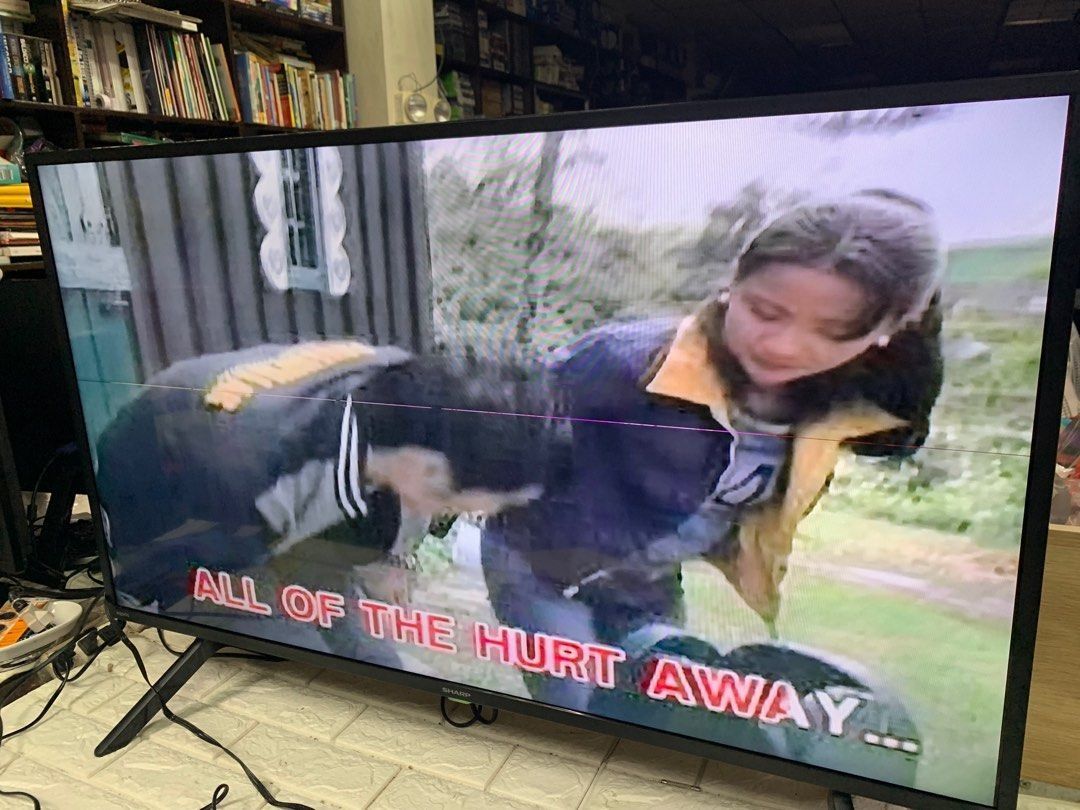 Sharp Android Smart 42” Led Backlight Tv ( with one horizontal line , very small) (Category: TV) located in Pasay City. Submitted by enrico_appliances (Listing ID 1315428677, Image 2). Description: Item is in good condition 2 220volts 42” smart android led tv with issue pls see attached pics for refernce with free remote .