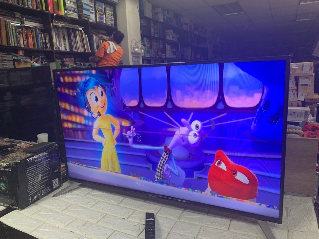 Sharp Android Smart 45” Led Backlight TV (with issue) (Category: TV) located in Pasay City. Submitted by enrico_appliances (Listing ID 1315425947, Image 1). Description: Item is in good condition working 220volts with remote controller with issue horizontal line in screen.