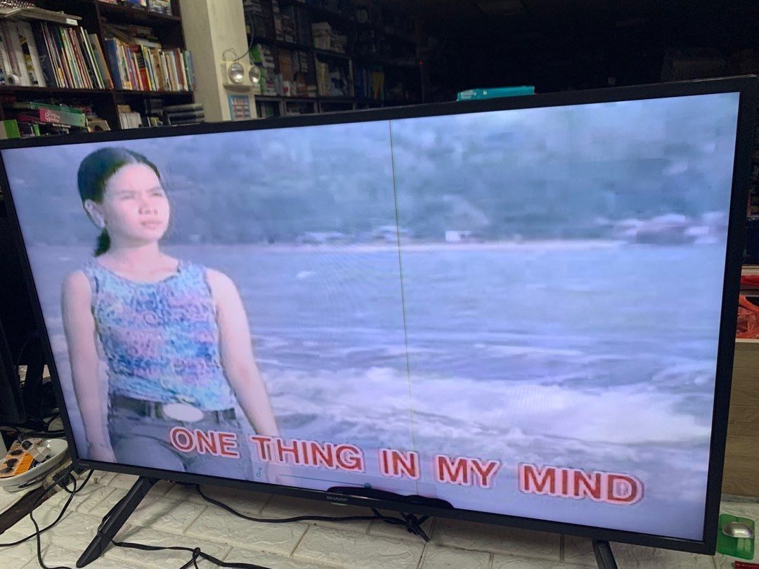 Sharp Smart Android 42” Led Backlight Tv (with issue 1 vertical line) (Category: TV) located in Pasay City. Submitted by enrico_appliances (Listing ID 1315429013, Image 2). Description: Item is in good condition working 220volts with free remote no box included issue 1 vertial line pls see attached pics.