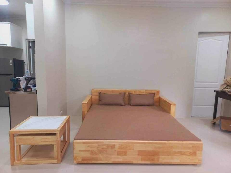 Solid wood sofa bed (Category: Sofas) located in Quezon City. Submitted by furniturefinds888 (Listing ID 1315432299, Image 1). Description: .