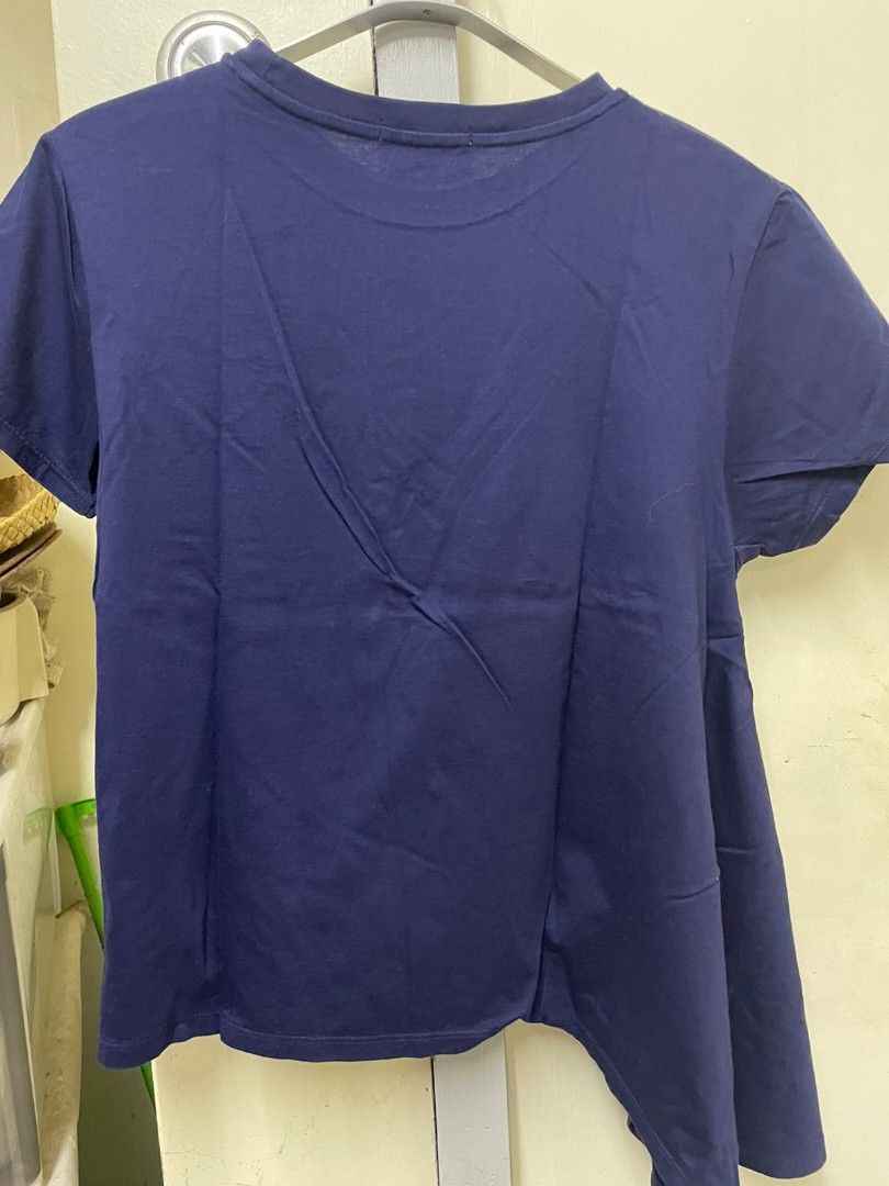 Uniqlo asymmetrical shirt (Category: Shirts) located in Butuan. Submitted by krishaun (Listing ID 1315412877, Image 2). Description: Uniqlo Size Medium Cotton/stretchy Laid flat: Chest - 19 inches Length - 23 / 28 (side) Very good condition Accepts gcash payment X gu x zara x muji.
