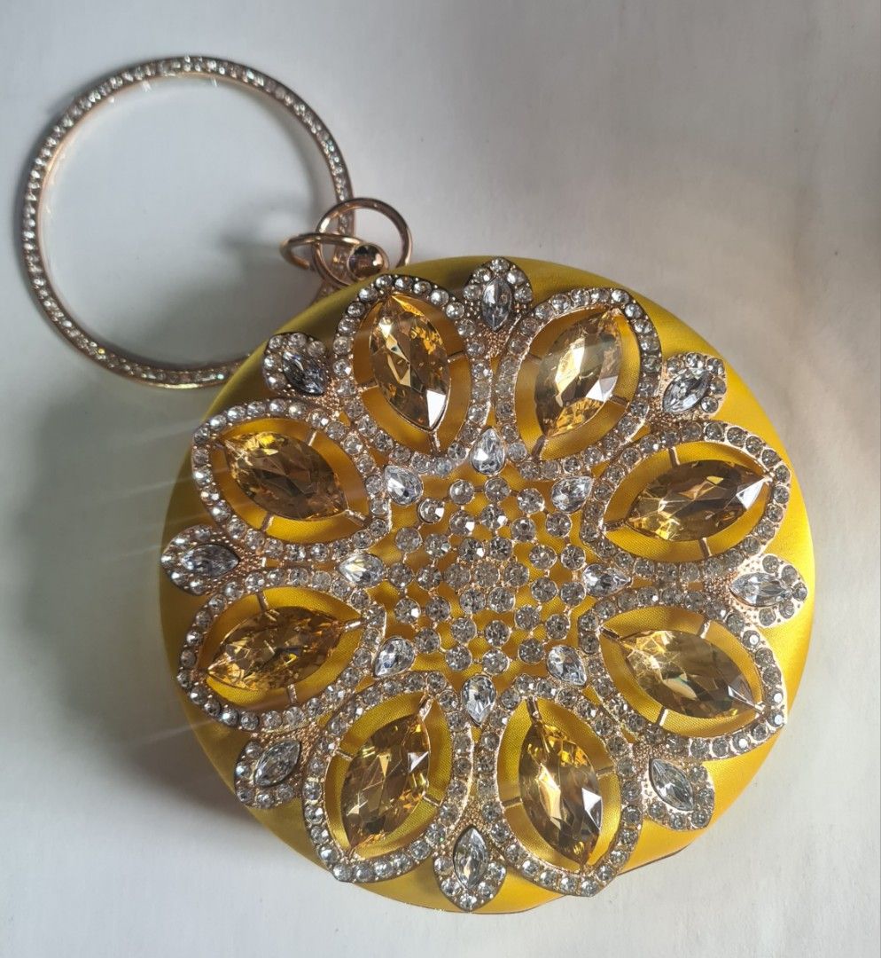 Yellow dazzling clutch for party (Category: Accessory Holder, Box & Organizers) located in Quezon City. Submitted by cdm19 (Listing ID 1315373958, Image 1). Description: Never been used! Sparkling stones. Lakas makasosyal..