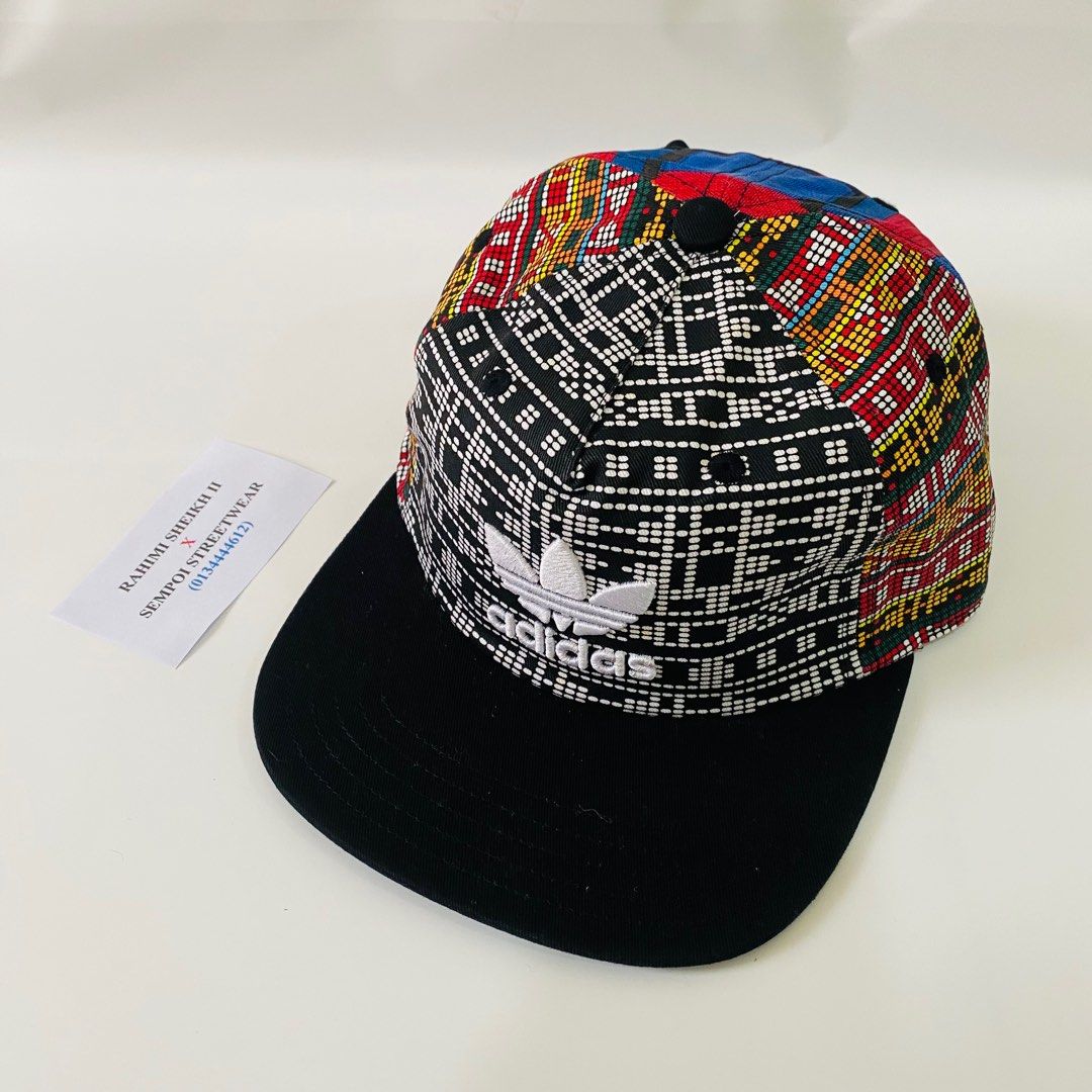 Adidas pharrell williams cap store