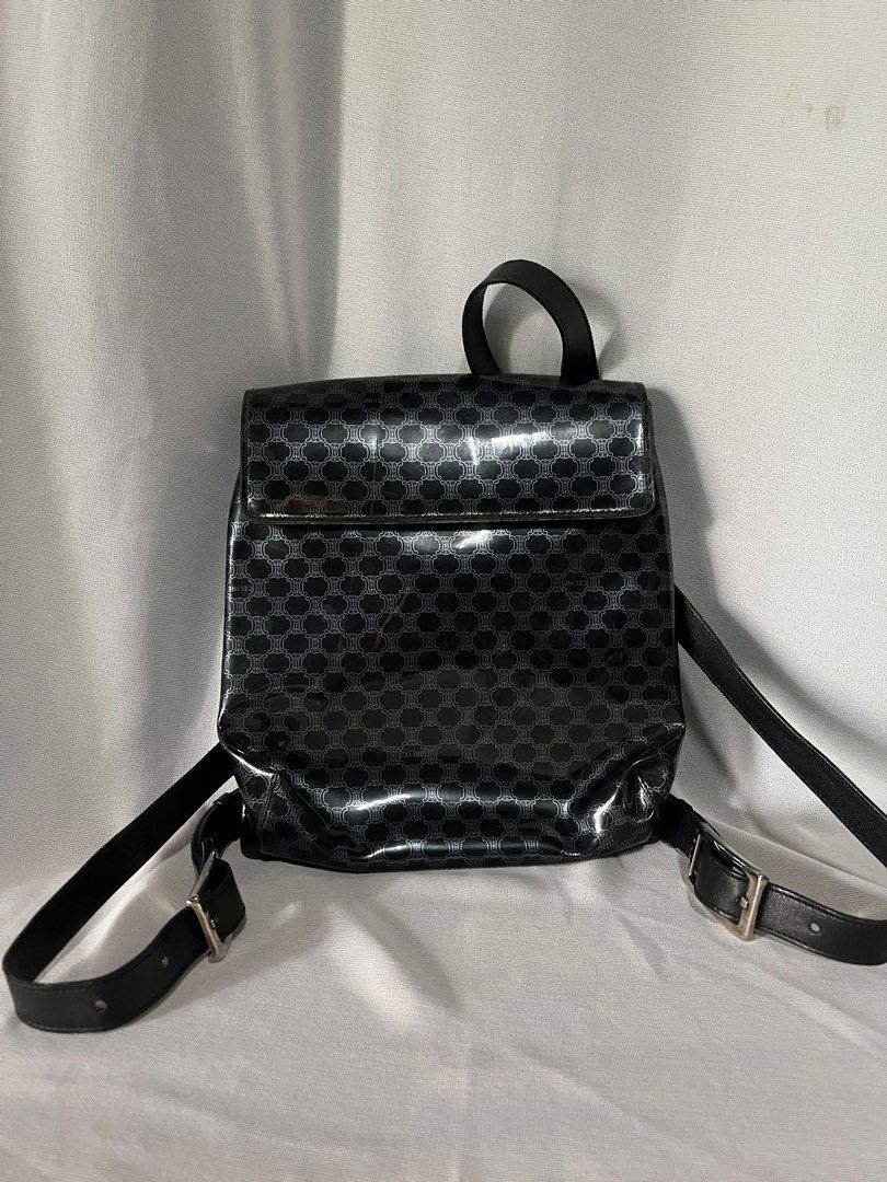 Authentic Celine Macadam PVC Backpack (Category: Luxury Bags & Wallets) located in Trece Martires City. Submitted by imwelllovedvintage (Listing ID 1315576607, Image 1). Description: ❗️No return, no exchange unless proven fake by professional authenticators❗️ Authentic Celine Macadam Mini Vinyl Backpack •has scratch sa front •need to retouch pipings •few hairlines sa hardware •straps still in good condition •clean inside •can fit a lot •free ship