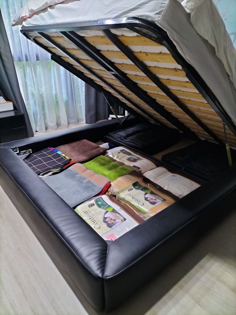 Bed frame (Category: Bed Frames & Mattresses) located in Singapore. Submitted by hcfc91 (Listing ID 1315560232, Image 2). Description: Storage below..