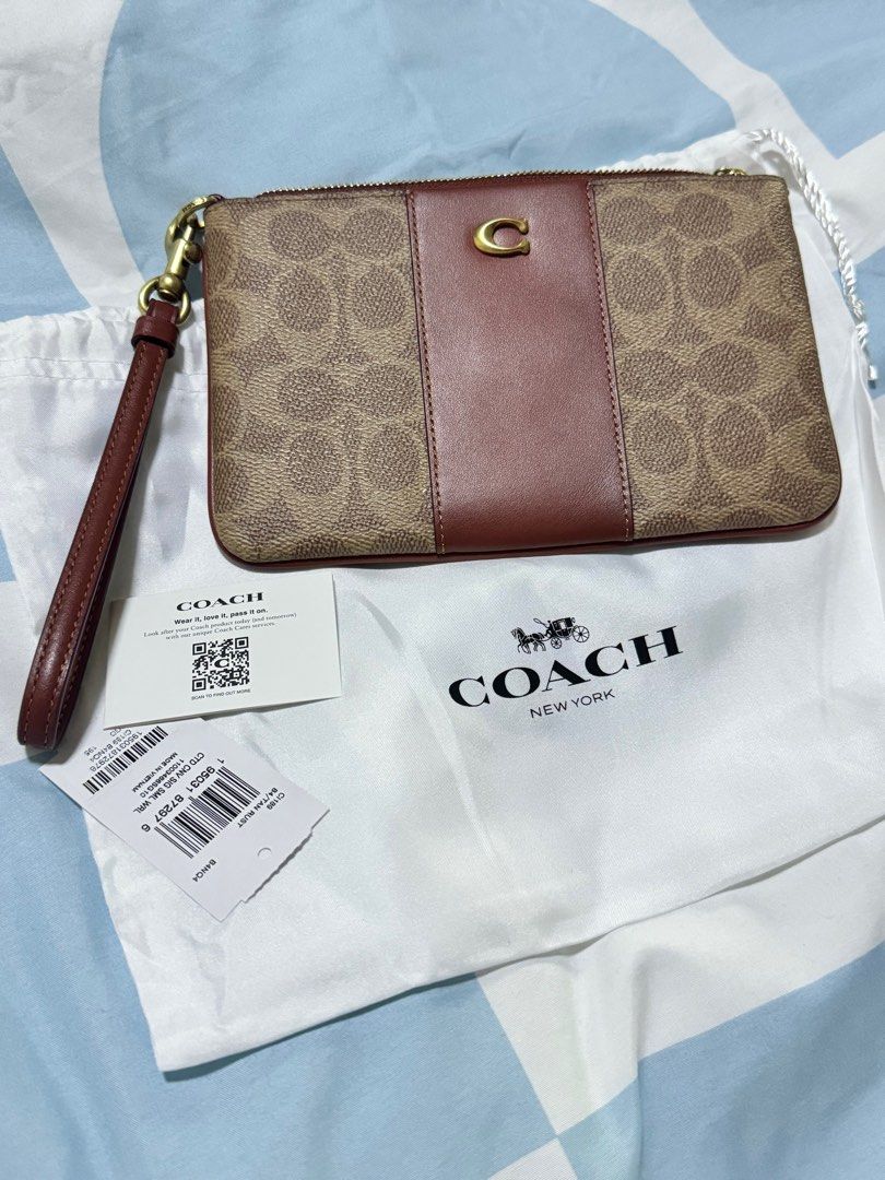 Small wristlet in colorblock signature canvas best sale
