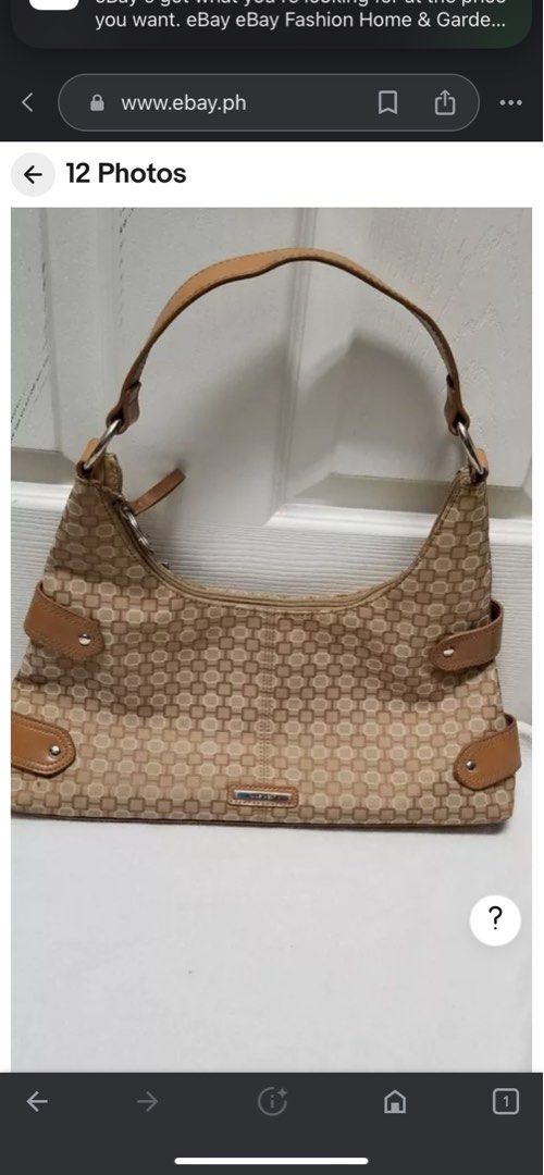 Looking for NINE WEST HOBO BAG BROWN (Category: Luxury Bags & Wallets) located in Manila. Submitted by 00000ml (Listing ID 1315524020, Image 1). Description: Looking for nine west brown bag pm me. Photo not mine.