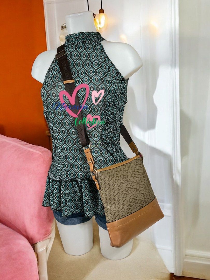 Louis Quatorze Crossbody Bag (Category: Purses & Pouches) located in La Trinidad. Submitted by naravincollections (Listing ID 1315694122, Image 1). Description: LP posted!!! Louis Quatorze Unisex Crossbody Sking Bag Very good condition Matibay na brand All details provided na po sa pics with dirt stain in the insde lining not sure if removable 💸🧧💸🧧Selling Price: 1250 Please scrutinize uploaded pictures for additional details. Send me message 