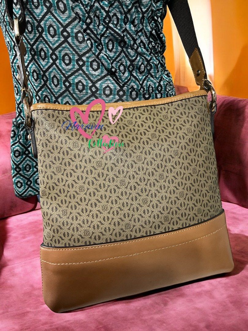 Louis Quatorze Crossbody Bag (Category: Purses & Pouches) located in La Trinidad. Submitted by naravincollections (Listing ID 1315694122, Image 2). Description: LP posted!!! Louis Quatorze Unisex Crossbody Sking Bag Very good condition Matibay na brand All details provided na po sa pics with dirt stain in the insde lining not sure if removable 💸🧧💸🧧Selling Price: 1250 Please scrutinize uploaded pictures for additional details. Send me message 