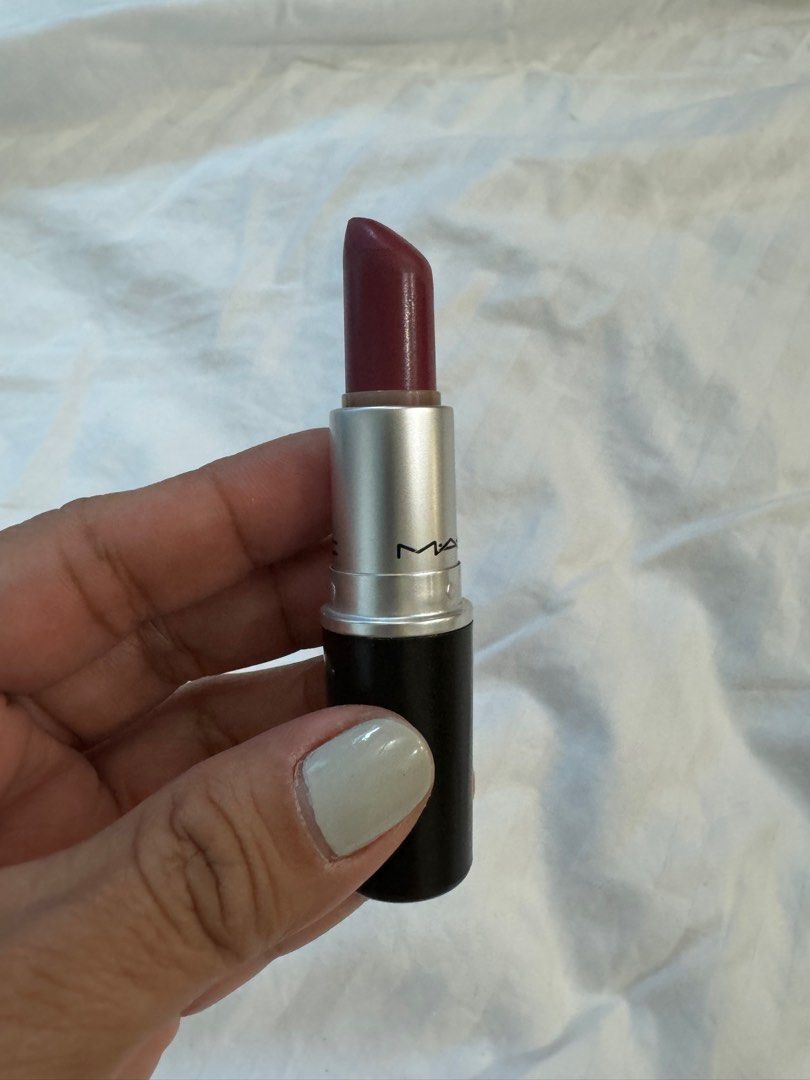 MAC Captive (Satin Lipstick) (Category: Makeup) located in Quezon City. Submitted by paolasoriano_wind (Listing ID 1315556866, Image 3). Description: Lightly used! 85% remaining. MAC Captive is a moderately cool-toned, medium plum with a satin finish. It is a permanent lipstick that retails for P1,200+. Bought from MAC SM Aura. .