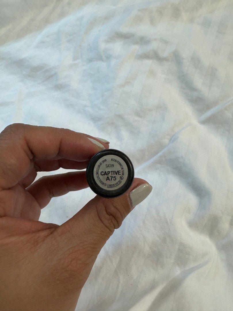 MAC Captive (Satin Lipstick) (Category: Makeup) located in Quezon City. Submitted by paolasoriano_wind (Listing ID 1315556866, Image 2). Description: Lightly used! 85% remaining. MAC Captive is a moderately cool-toned, medium plum with a satin finish. It is a permanent lipstick that retails for P1,200+. Bought from MAC SM Aura. .