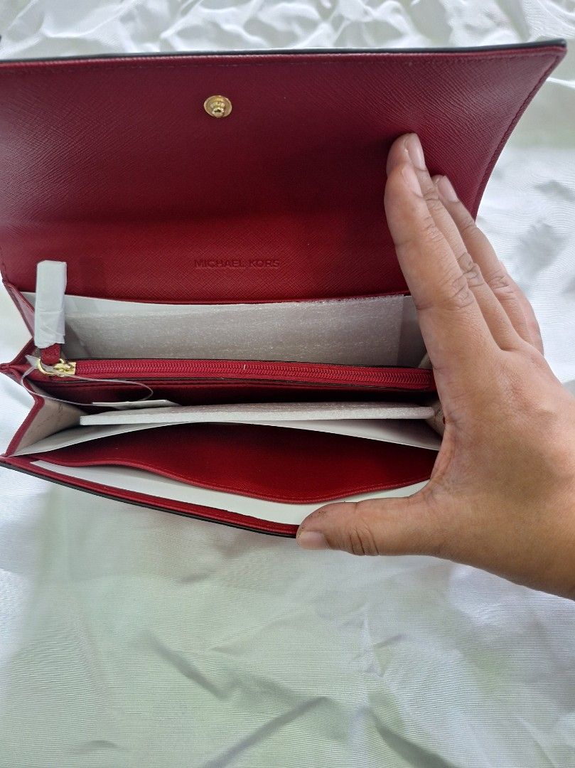 Michael Kors Jet Set Travel Wallet (Category: Wallets & Card holders) located in Quezon City. Submitted by tms.l (Listing ID 1315582378, Image 3). Description: Brandnew Intact tags and protective coverings Bought in US Color: Red Hardware: Gold.