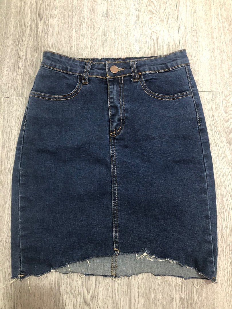 Plain tattered blue denim skirt (Category: Skirts) located in Caloocan City. Submitted by justczy (Listing ID 1315525189, Image 1). Description: Good for XS Lenght 17 Waistline 24inch .