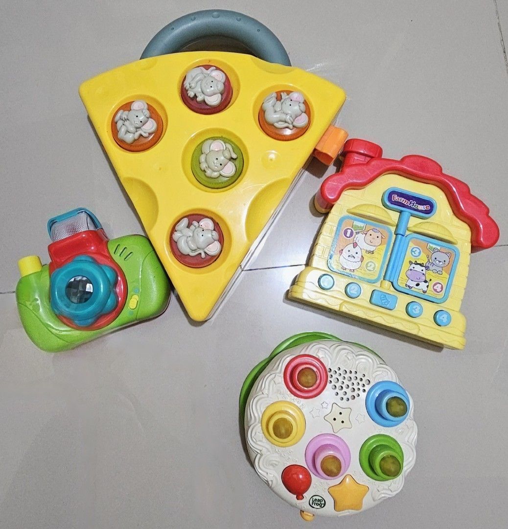 Preloved Leapfrog cake, Hit the Mouse, Farm Sound Book, Camera (bundle) (Category: Children's Books) located in Batangas. Submitted by pompee123 (Listing ID 1315688035, Image 1). Description: All in working condition with sounds and lights. SM Batangas City Meet-up.
