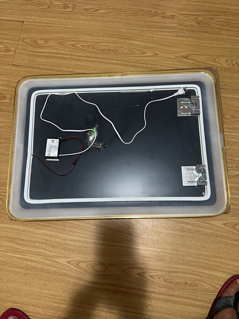 smart dimable LED mirror (Category: Makeup) located in Pasig City. Submitted by laubayag (Listing ID 1315663766, Image 3). Description: smart LED mirror with gold frame 27.5 inches height 19.5 inches width 1inch thick touch control dimmable .