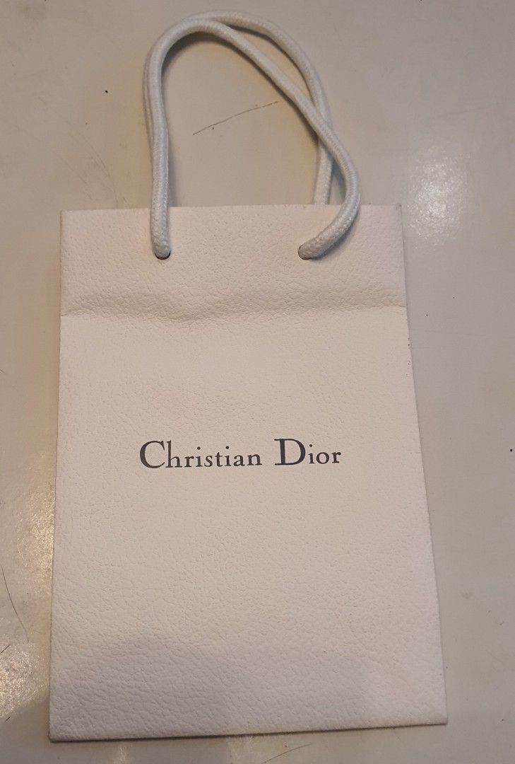 Authentic christian dior paper bag (Category: Luxury Bags & Wallets) located in Cavite. Submitted by ohmie23 (Listing ID 1315831499, Image 1). Description: Authentic christian dior paper bag demtion 6x8.5 inch.