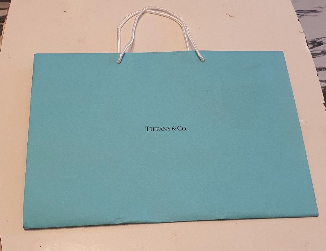 Authentic tiffany & co paper bag (Category: Luxury Bags & Wallets) located in Cavite. Submitted by ohmie23 (Listing ID 1315830333, Image 1). Description: Authentic tiffany & co paper bag.