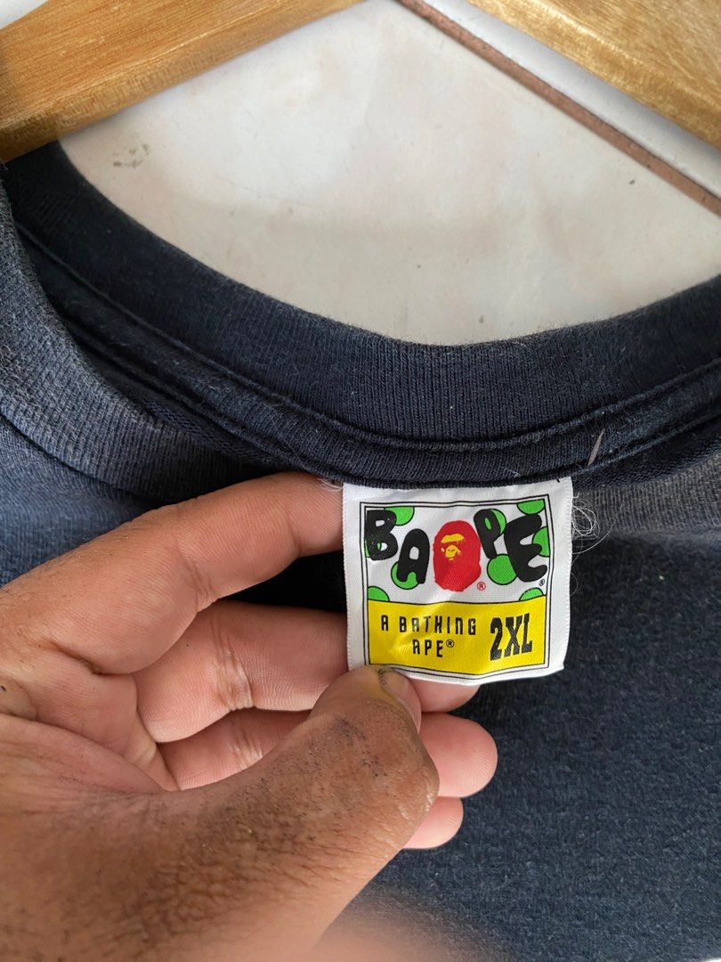 BAPE authentic (Category: Tshirts & Polo Shirts ) located in Pinamalayan. Submitted by initialthriftstore (Listing ID 1315723321, Image 2). Description: FOR SALE ‼️ Bape Authentic Still in very good condition ✅ Color Rate: 9.3/10 ✅ Dimes: 31x24 Issues: Minimal fades in neck and sleeves Pm lang po mga boss baka may gusto sainyo😇🤍.