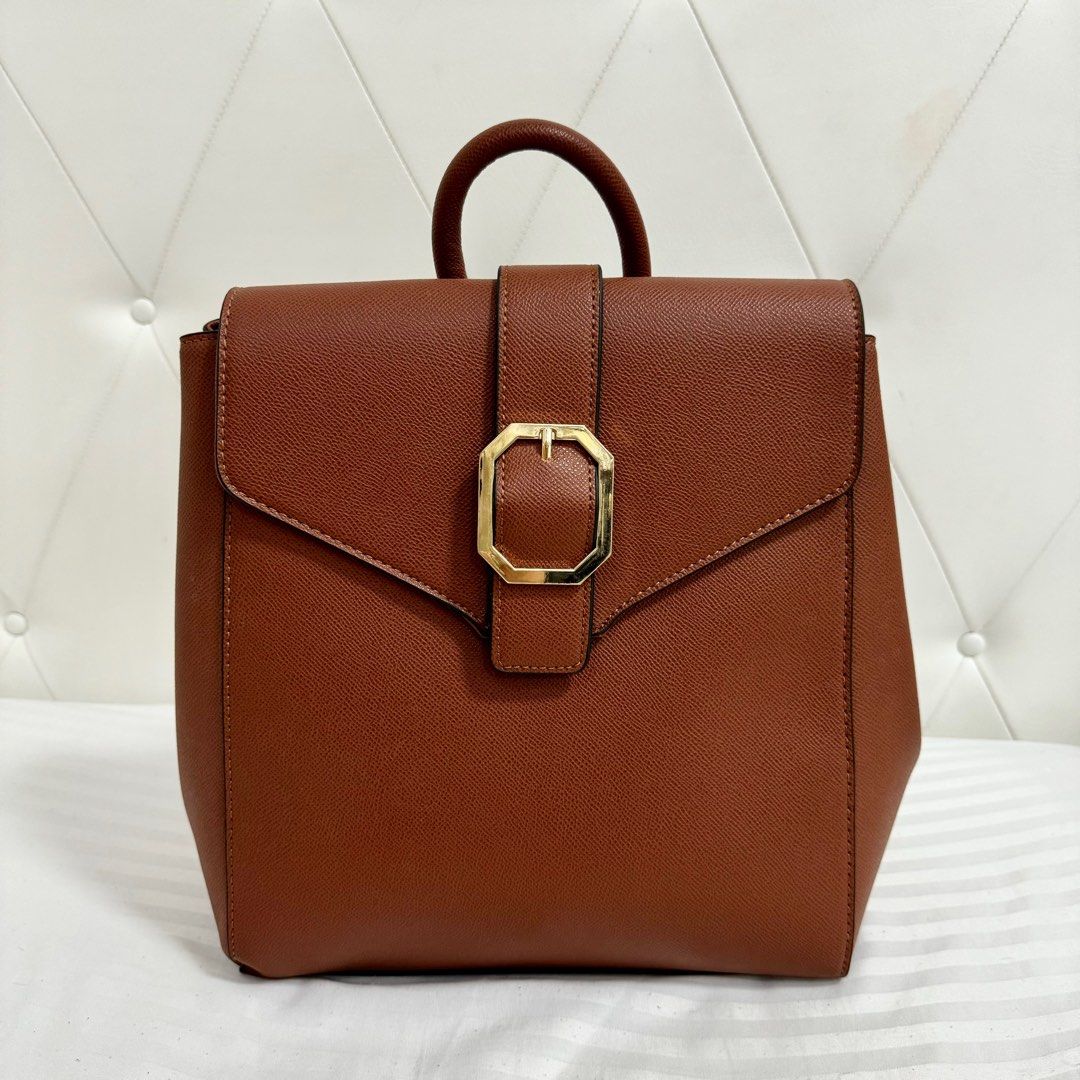 BNEW Bata Brown Backpack (Category: Backpacks) located in Quezon City. Submitted by kcdeclutters (Listing ID 1315844704, Image 1). Description: Brand new with dustbag Super good quality and spacious! Still with tag Adjustable straps No flaws Rfs: Decluttering. I have too many bags already..