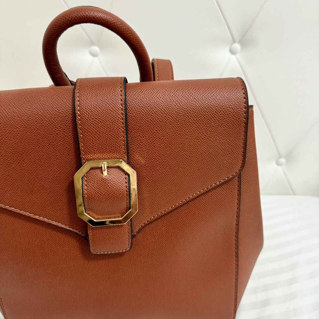 BNEW Bata Brown Backpack (Category: Backpacks) located in Quezon City. Submitted by kcdeclutters (Listing ID 1315844704, Image 2). Description: Brand new with dustbag Super good quality and spacious! Still with tag Adjustable straps No flaws Rfs: Decluttering. I have too many bags already..