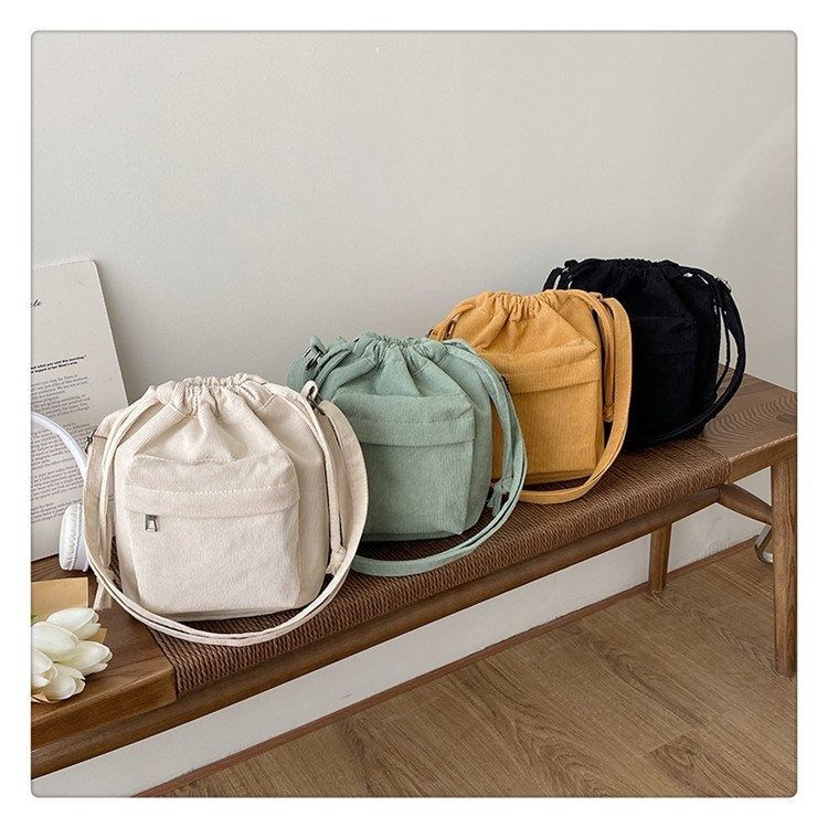 Japanese crossbody bag 2024 new small fresh corduroy small bag student Teenager drawstring bucket shoulder bag for women Women s Fashion Bags Wallets Cross body Bags on Carousell