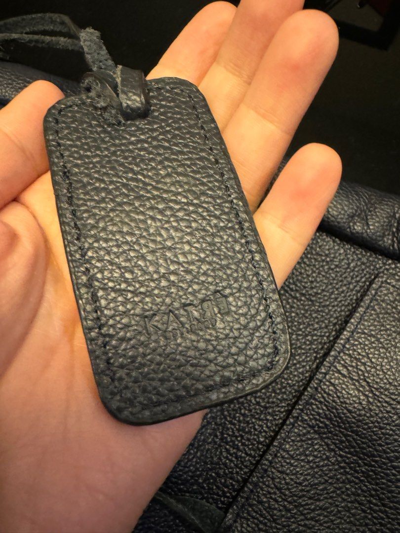 Katre Leather Baker Tote Bag (Navy Blue) (Category: Tote Bags) located in Malabon City. Submitted by yao.ming (Listing ID 1315827802, Image 3). Description: Slightly Negotiable Bought this but was surprised with the size, it’s really big and can fit laptops/ipad/etc. Haven’t used, just been stored because it’s a bit heavy since it’s legit leather ! :) Good for work/school Can fit a lot of things Includes free pouch .