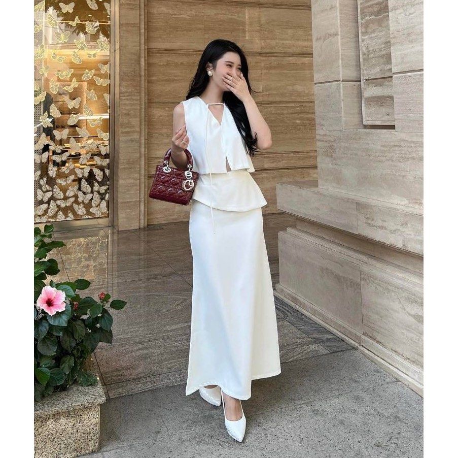 M Cumiii Boutique Vietnamese Brand Swing Crop Top Asymmetrical Layered Flare Maxi Skirt Set in White Women s Fashion Dresses Sets Sets or Coordinates on Carousell