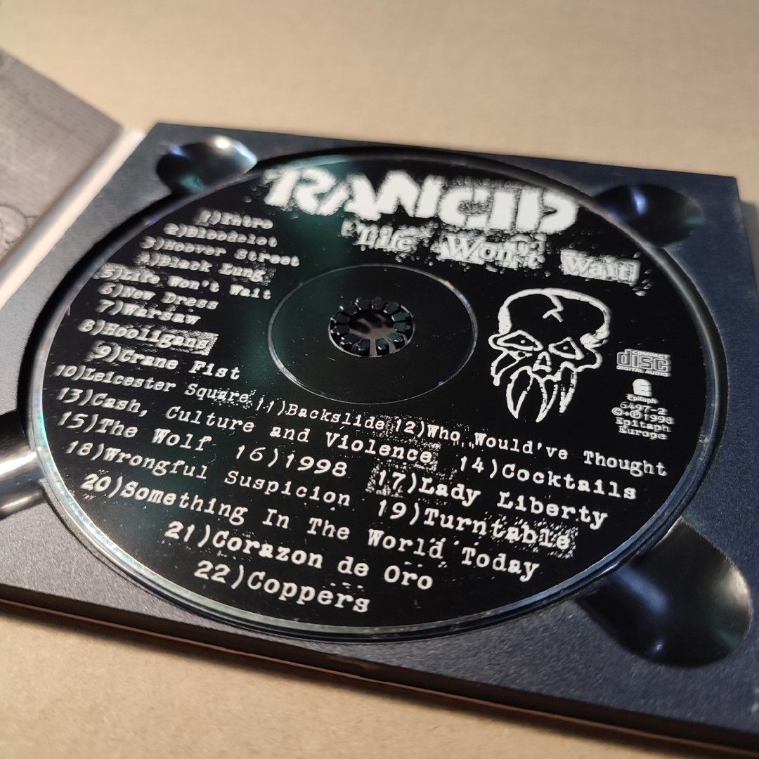 Rancid - Life Won't Wait CD VG+ (Category: CDs & DVDs) located in Imus. Submitted by andrianbooks (Listing ID 1315726326, Image 3). Description: CD/Media: VG+ Inlay/Booklet: VG Note: CD case is not included in the rating of the item. Payment via Gcash only. Shipping via J&T (80 pesos) and Lalamove/Grab only (Loc Imus Cavite). GRADING SYSTEM: Mint (M) Perfect. No scuffs/scratches, unplayed - possibly still sealed. Insert/Inlay/Booklet/Sleeve/Digip