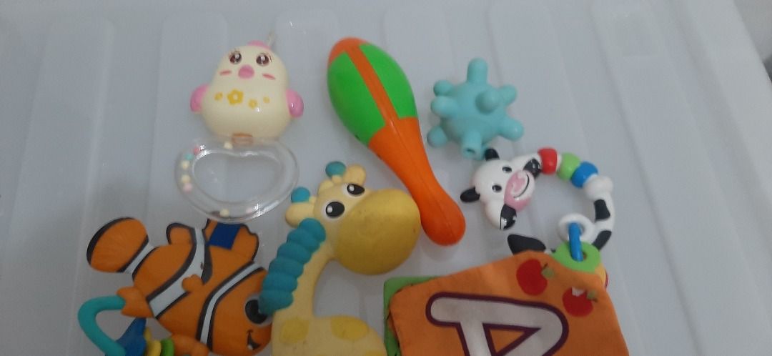 Random baby toys (Category: Kids Toys) located in Mendez-Nunez. Submitted by dollforless (Listing ID 1315702233, Image 2). Description: As is Needs cleaning.