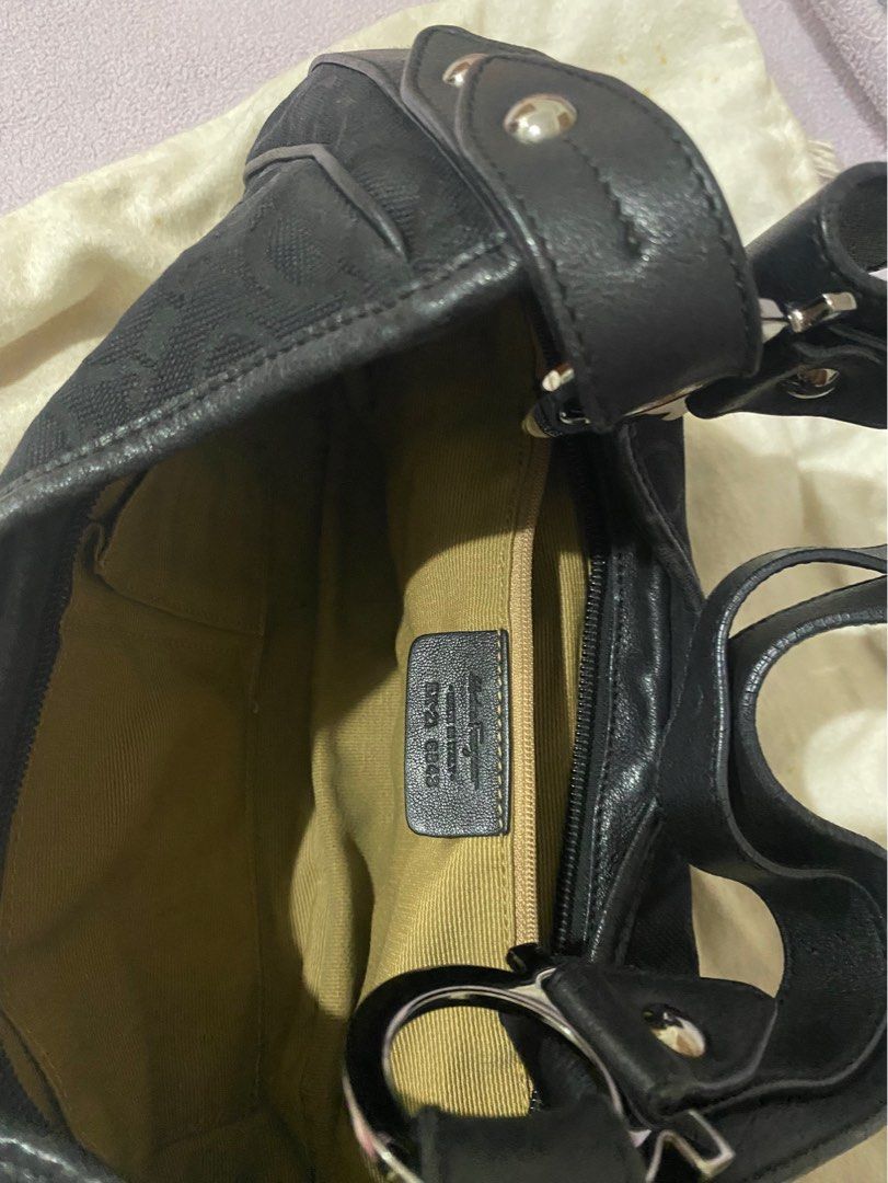Salvatore Ferragamo bag (Category: Luxury Bags & Wallets) located in Paranaque City. Submitted by ejgscloset (Listing ID 1315864938, Image 2). Description: Authentic Salvatore Ferragamo Black Canvas and Leather Gancini Shoulder Bag comes with dust bag.
