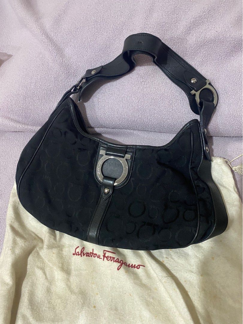 Salvatore Ferragamo bag (Category: Luxury Bags & Wallets) located in Paranaque City. Submitted by ejgscloset (Listing ID 1315864938, Image 1). Description: Authentic Salvatore Ferragamo Black Canvas and Leather Gancini Shoulder Bag comes with dust bag.