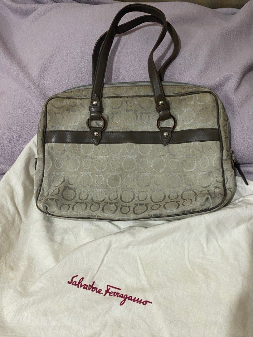 Salvatore Ferragamo Bag (Category: Luxury Bags & Wallets) located in Paranaque City. Submitted by ejgscloset (Listing ID 1315865898, Image 2). Description: Authentic Salvatore Ferragamo Bag Color grey brown Exterior needs cleaning Comes with dust bag.