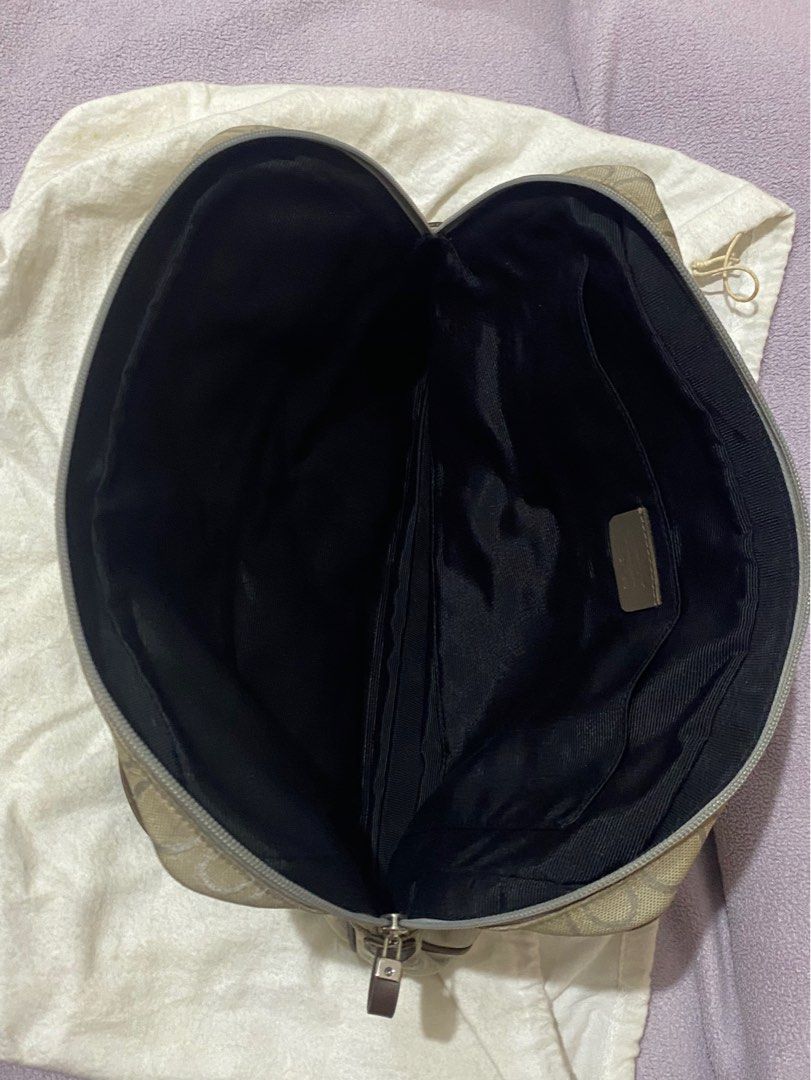 Salvatore Ferragamo Bag (Category: Luxury Bags & Wallets) located in Paranaque City. Submitted by ejgscloset (Listing ID 1315865898, Image 3). Description: Authentic Salvatore Ferragamo Bag Color grey brown Exterior needs cleaning Comes with dust bag.
