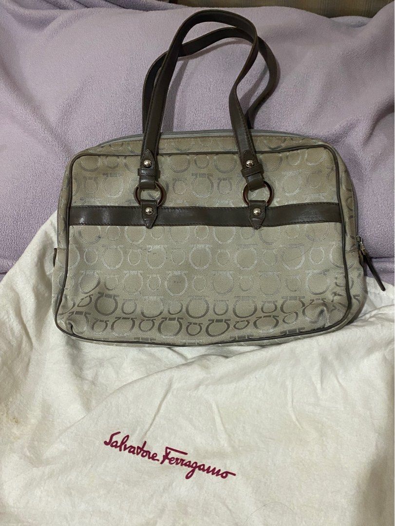 Salvatore Ferragamo Bag (Category: Luxury Bags & Wallets) located in Paranaque City. Submitted by ejgscloset (Listing ID 1315865898, Image 1). Description: Authentic Salvatore Ferragamo Bag Color grey brown Exterior needs cleaning Comes with dust bag.