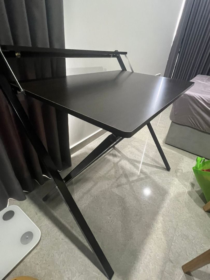 Study table (Category: Tables & Sets) located in Singapore. Submitted by blueblack787 (Listing ID 1315760389, Image 2). Description: Like new, self collect. Dimension (estimate): Height 80cm; Width 80cm; Length 60cm.