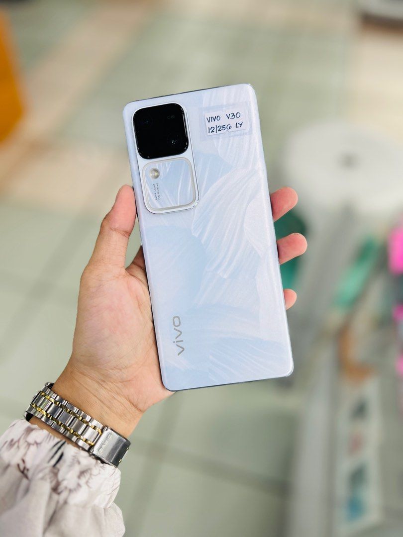 Vivo V30 12/256gb Openline (Category: Vivo) located in San Juan City. Submitted by aynaagadgets (Listing ID 1315883533, Image 1). Description: FOR SALE | TRADE / SWAP PASS SA MGA SCAMMERS / THIRD PARTY (RFS: Buy and Sell) VIVO V30 OPENLINE ⬇️DETAILS⬇️ •12/256 GB (Other storage is also available) •Openline (Other Variant is also available but different price) •White (Other color is also available but price may vary) •NTC Approved •98% Smooth •True