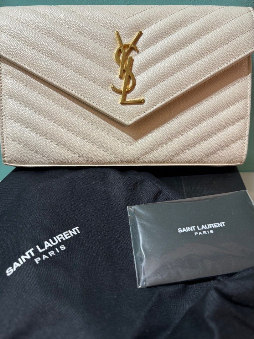 YSL WOC (Category: Luxury Bags & Wallets) located in Quezon City. Submitted by rachellec (Listing ID 1315801442, Image 1). Description: With box, dustbag, cards.