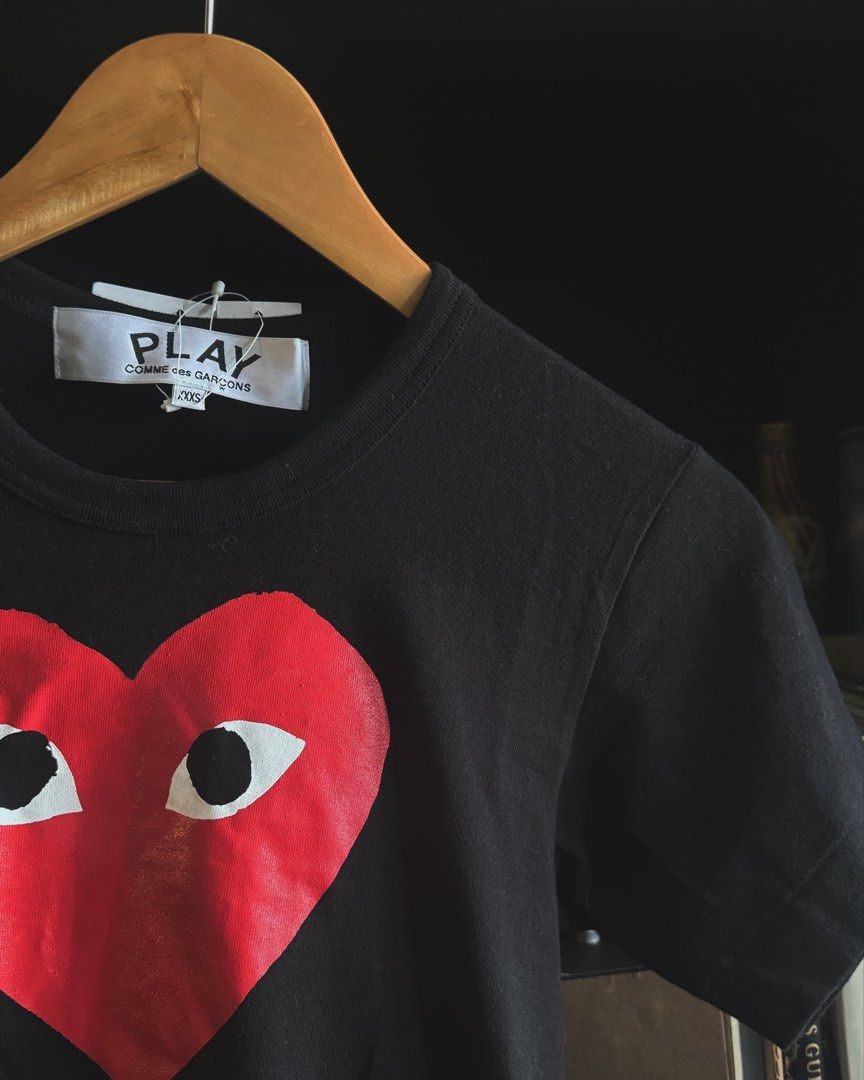 COMMES de Garcones CDG shirt XXXS (Category: Shirts) located in Pasig City. Submitted by milliedeluna (Listing ID 1315975886, Image 2). Description: CDG COMME Des Garcones Black TShirt Large Heart in XXXS 🖤 Condition: Never used, BNWT RFS: I don’t really wear shirts! Sayang! Selling for: 3200 (Purchase Price, super discounted!) SRP: 9460 Yen Purchased From: Tokyo, JAPAN! 🖤.