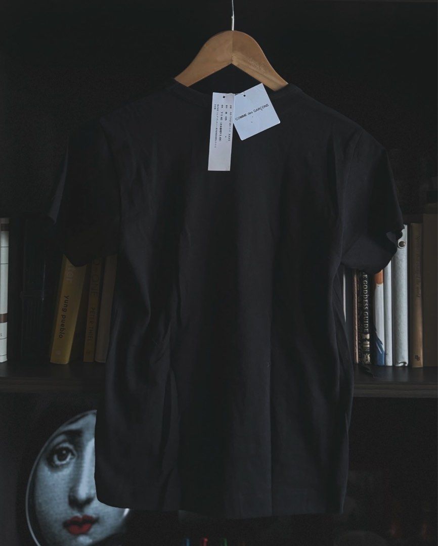 COMMES de Garcones CDG shirt XXXS (Category: Shirts) located in Pasig City. Submitted by milliedeluna (Listing ID 1315975886, Image 3). Description: CDG COMME Des Garcones Black TShirt Large Heart in XXXS 🖤 Condition: Never used, BNWT RFS: I don’t really wear shirts! Sayang! Selling for: 3200 (Purchase Price, super discounted!) SRP: 9460 Yen Purchased From: Tokyo, JAPAN! 🖤.