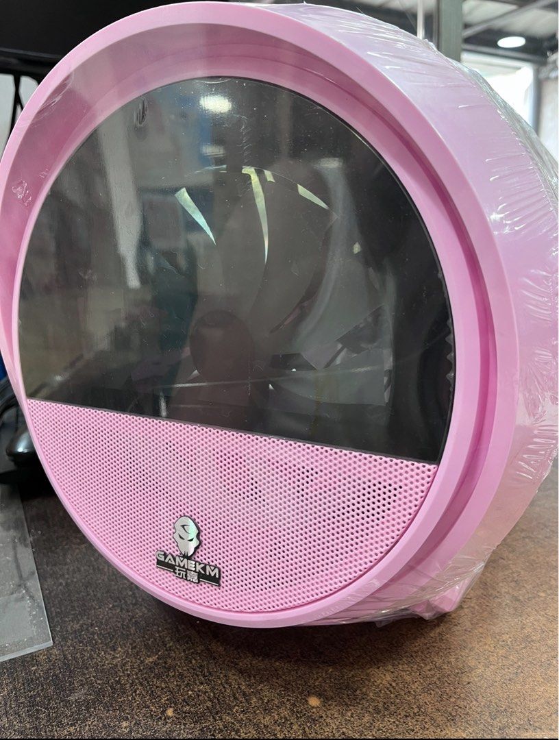 CPU CASE: GAMEKM BOMB Pink M-ATX GAMING CASE (Category: Cases & Covers) located in Quezon City. Submitted by mjmic (Listing ID 1316010770, Image 2). Description: GAMEKM BOMB Pink M-ATX GAMING CASE Description: CASE Size L450*W315*H350MM Side cover is Acrylic / Arc design Compatible M-ATX /ITX Motherboard Space for Hard Drive 3.5” HDD x 2 /2.5” SSD x 2 Weight 11Kg Heatsink Height limit 165 mm Graphics card length limit 320 mm Support 240 water coo