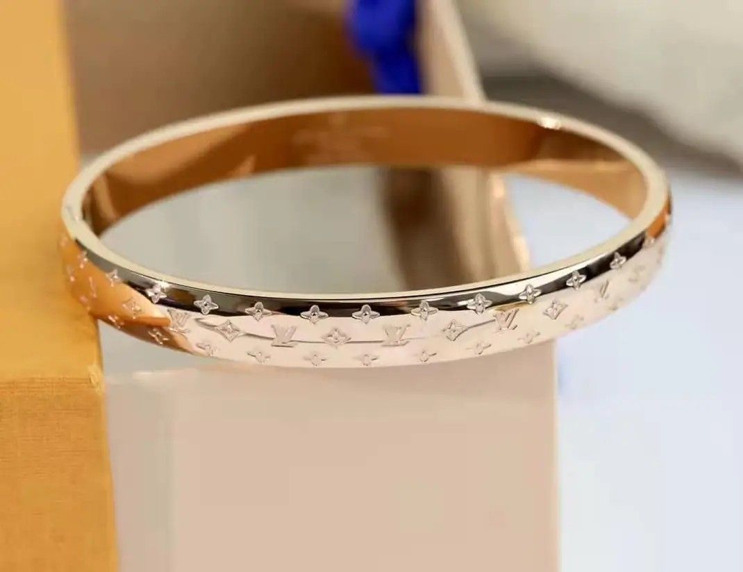 Elegant Bangle Iconic Brand, Women's Fashion, Jewelry & Organizers ...