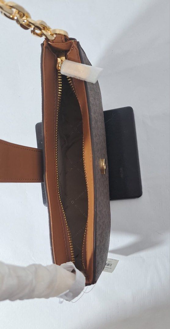 MK small pouchette mono Original (Category: Luxury Bags & Wallets) located in Quezon City. Submitted by meant_4_u (Listing ID 1315987691, Image 2). Description: 😱On hand Ph and ready to ship 😍 "LAST PRICE posted 👋🏼 😲 Original michael kors small pouchette mono 🔖 SRP: 26,400 ✅ inclusions: Tag, paper bag(limited), care card 🤗 Guaranteed Original from USA 🤑 MOP: BPI / BDO/ metrobank/ Gcash-gcash transfer #meant_4_u #originalmichaelkorsusa #mk