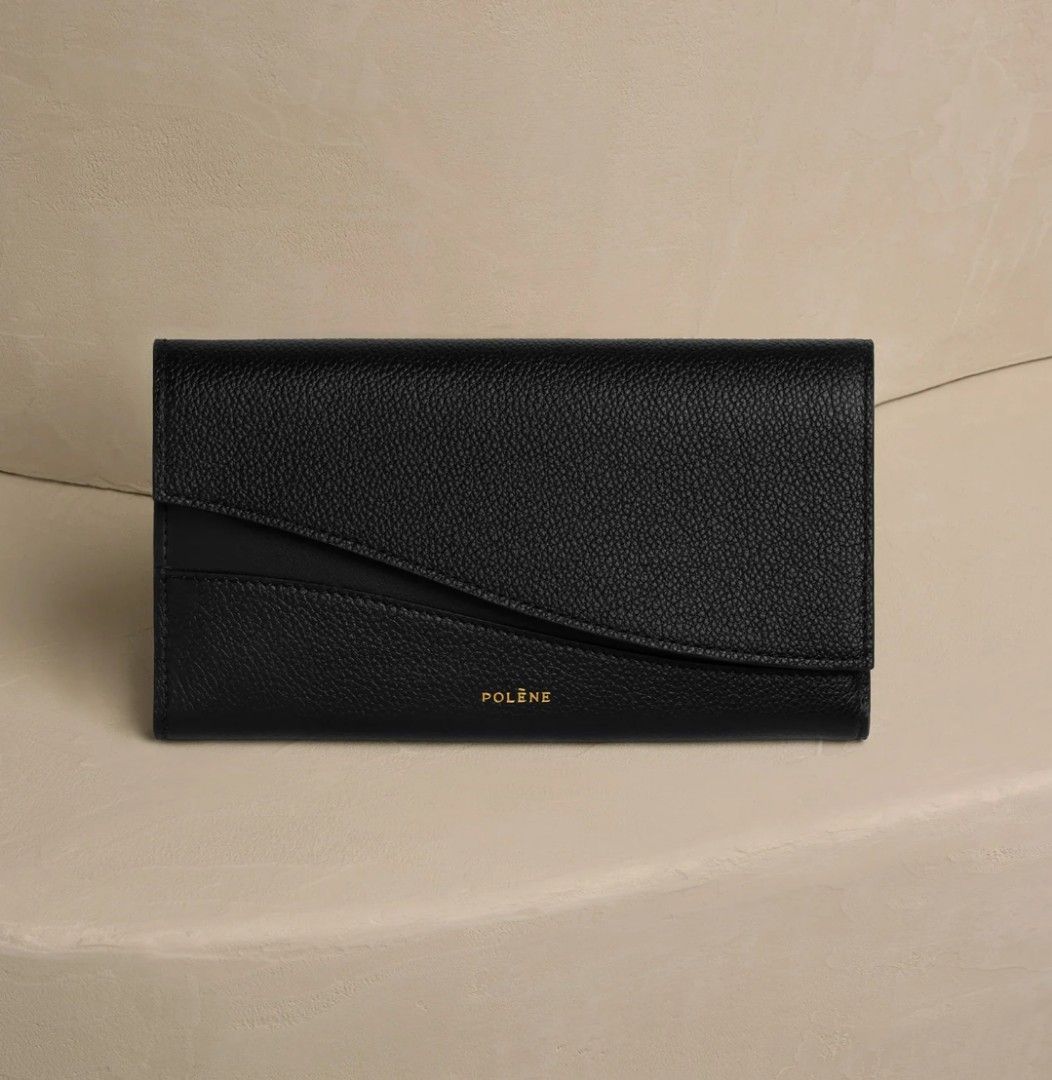 Polene Sierra Wallet - Black (Category: Luxury Bags & Wallets) located in Manila. Submitted by goods4all (Listing ID 1315898087, Image 1). Description: Dimensions: 19 x 10.5 x 3 cm Weight: 204 g Leather-covered magnetic closure. One zipped compartment, two middle pockets, and six compartments for credit cards. Will come with box.