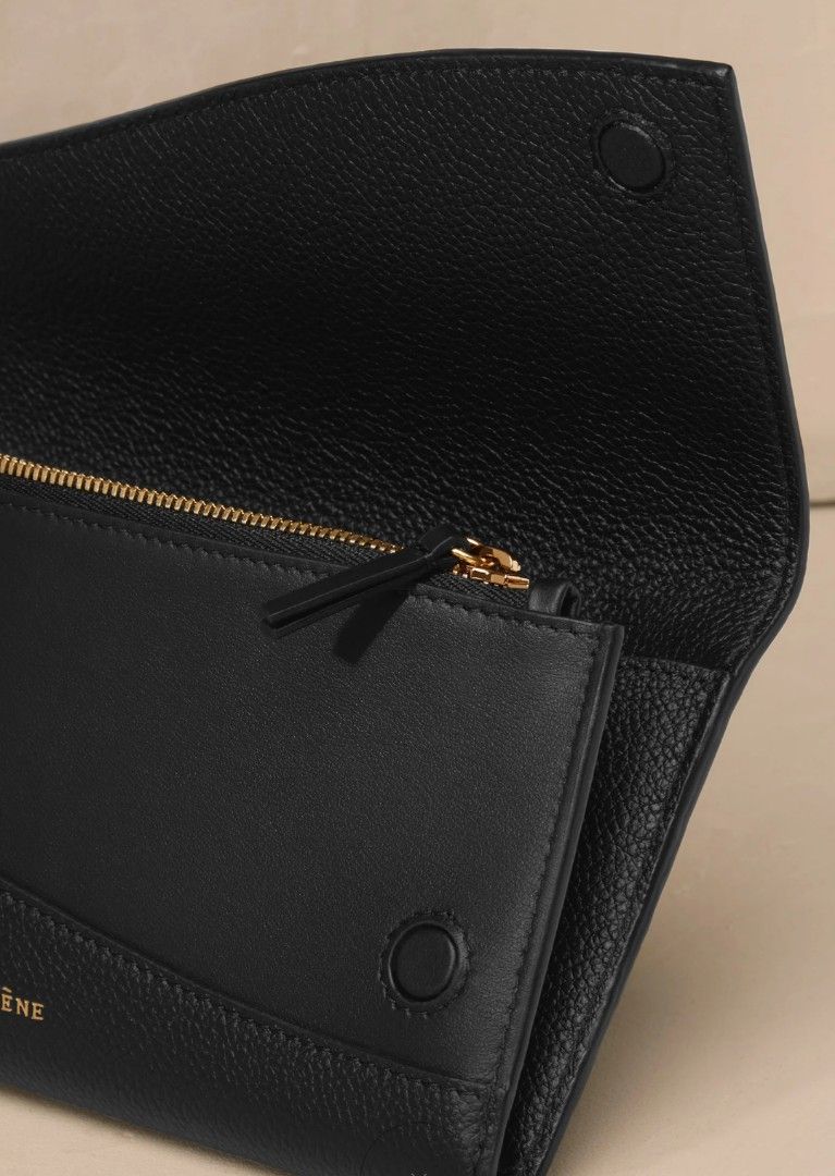 Polene Sierra Wallet - Black (Category: Luxury Bags & Wallets) located in Manila. Submitted by goods4all (Listing ID 1315898087, Image 2). Description: Dimensions: 19 x 10.5 x 3 cm Weight: 204 g Leather-covered magnetic closure. One zipped compartment, two middle pockets, and six compartments for credit cards. Will come with box.