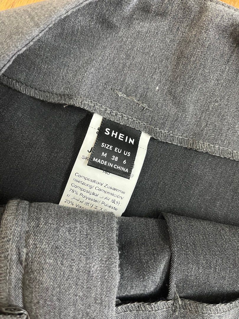 shein grey office short skirt (Category: Skirts) located in Manila. Submitted by moooonlight_ (Listing ID 1315947109, Image 2). Description: dm for inquiries ♡.