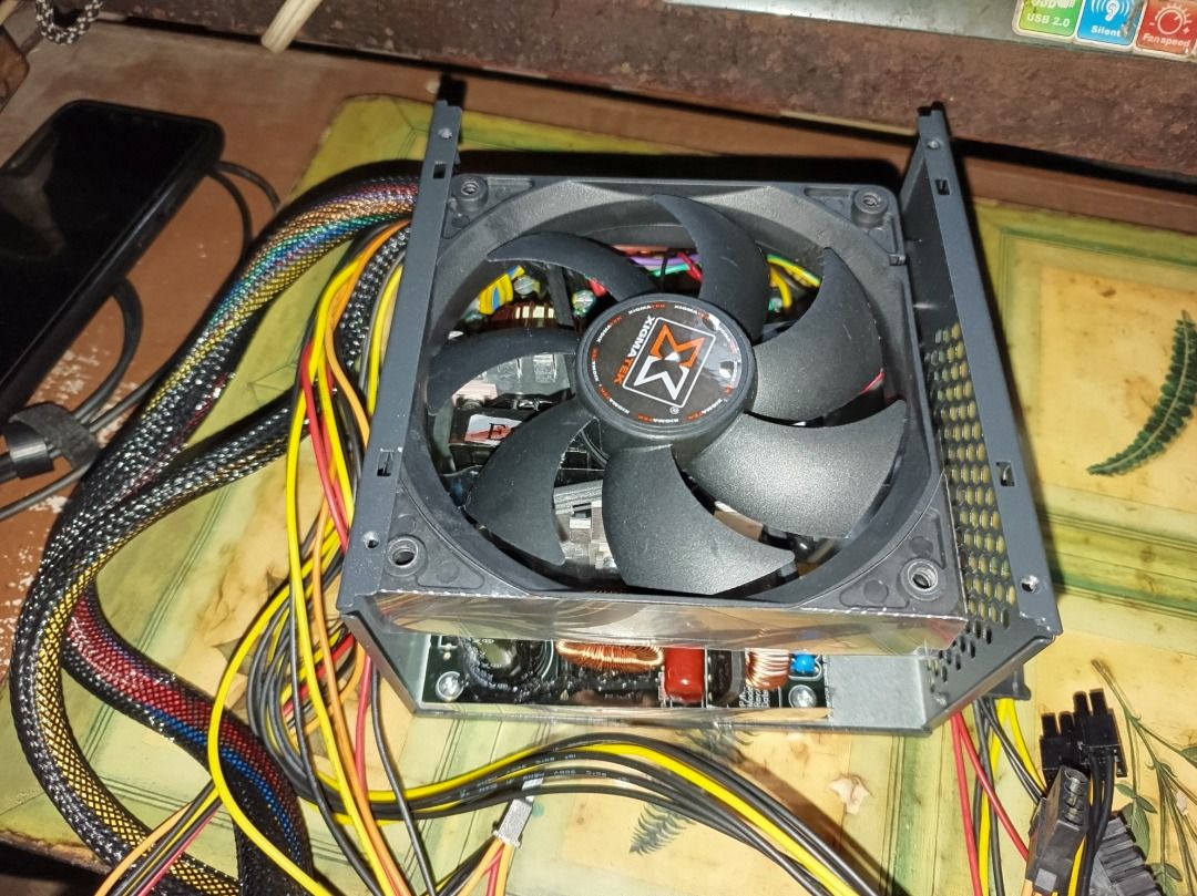 Xigmatek X-Power 600W PSU *Defective* (Category: Computer Parts) located in Valenzuela. Submitted by etechete (Listing ID 1315955509, Image 2). Description: ⚠️ WARNING! BUY AT YOUR OWN RISK! THINK HARDER BEFORE YOU MAKE YOUR DECISION!⚠️ I'm selling this broken Xigmatek X-Power 600W PC Power Supply Unit, completed with the box. Here are the ff: • I purchased this item on May 2024 📆, and the original cost was "Php 1,800" from a local computer shop